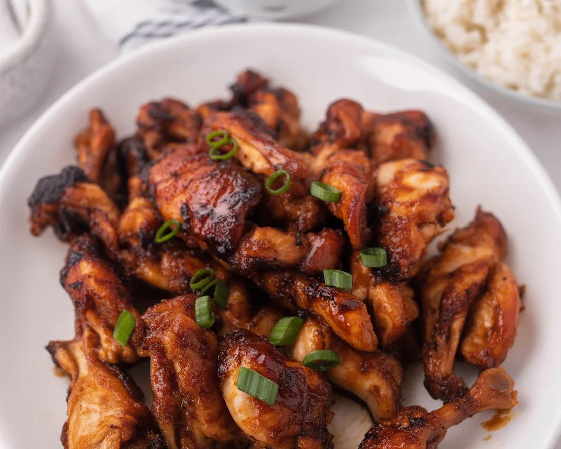 Delicious Air Fryer Teriyaki Chicken thighs glazed with homemade teriyaki sauce.