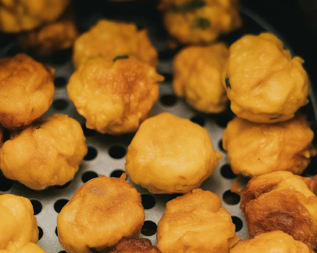 Crispy Air Fryer Fried Pickles served with dipping sauce.