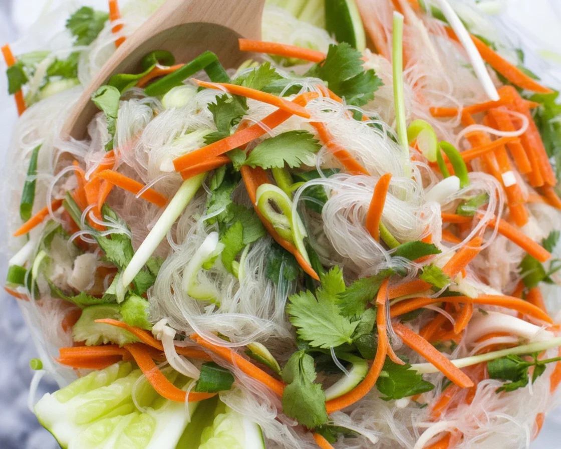 Deliciously Simple Vietnamese Glass Noodle Salad to Try Today 1 Delicious Vietnamese Glass Noodle Salad with fresh herbs and vibrant vegetables.